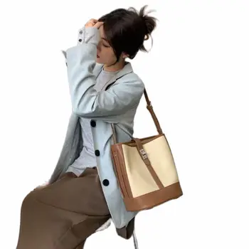 Premium top kožená taška cowhide podpazušia taška 2022 Nový Vintage všestranné ženské Rameno Messenger Vedro Vrece